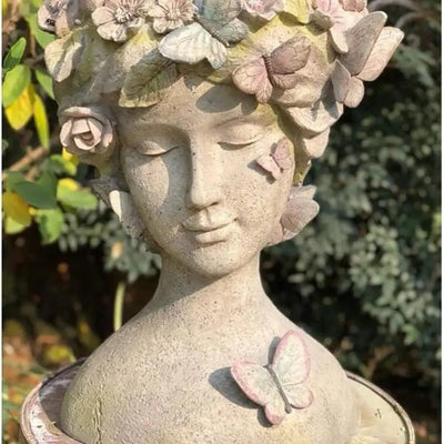 RESIN YOUNG GIRL PLANTER WITH COLORFUL BUTTERFLY