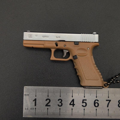 New Empire 1:3 Glock G17 alloy keychain, realistic gun model with detachable soldier gear & bullets.