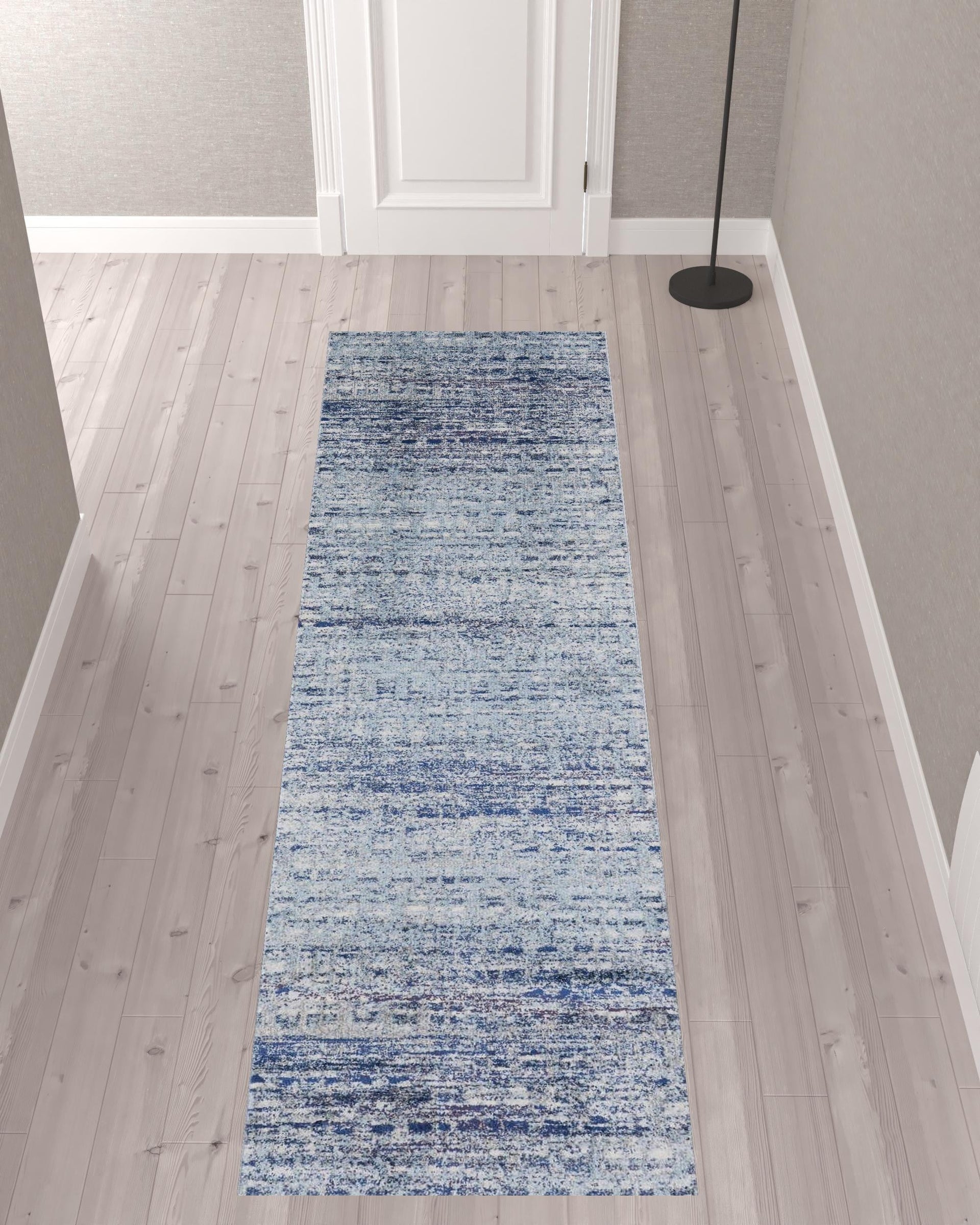 10' X 14' Blue And Ivory Abstract Power Loom Stain Resistant Area Rug