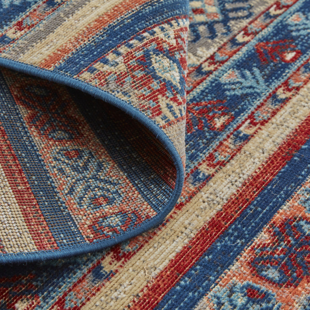 10' X 13' Blue Red And Ivory Geometric Distressed Area Rug