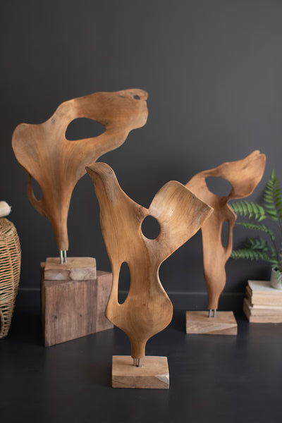 HAND-CARVED TEAK WOOD SCUPLTURE ON A BASE - SMOOTH