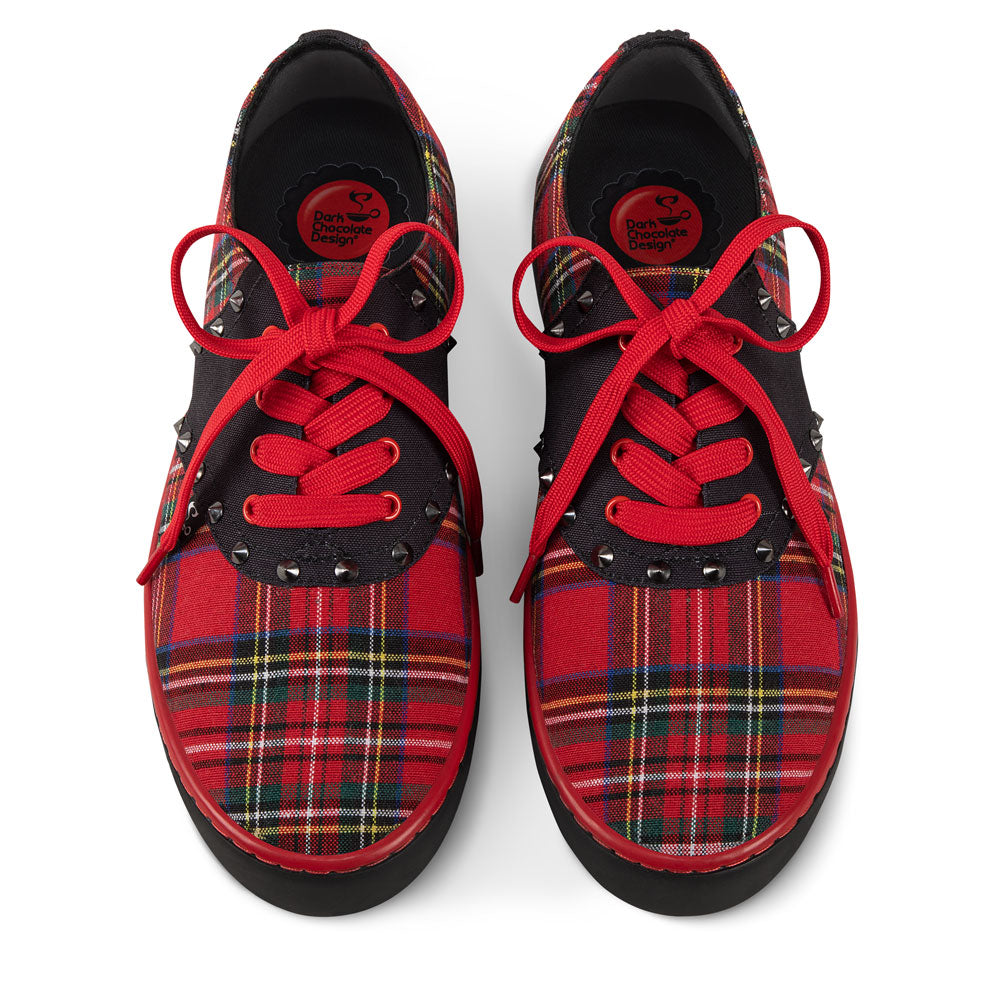 Red plaid shoes with black accents and red laces on a white background