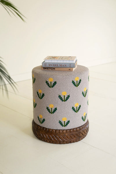 UPHOLSTERED OTTOMAN WITH CARVED WOOD BASE - GREY