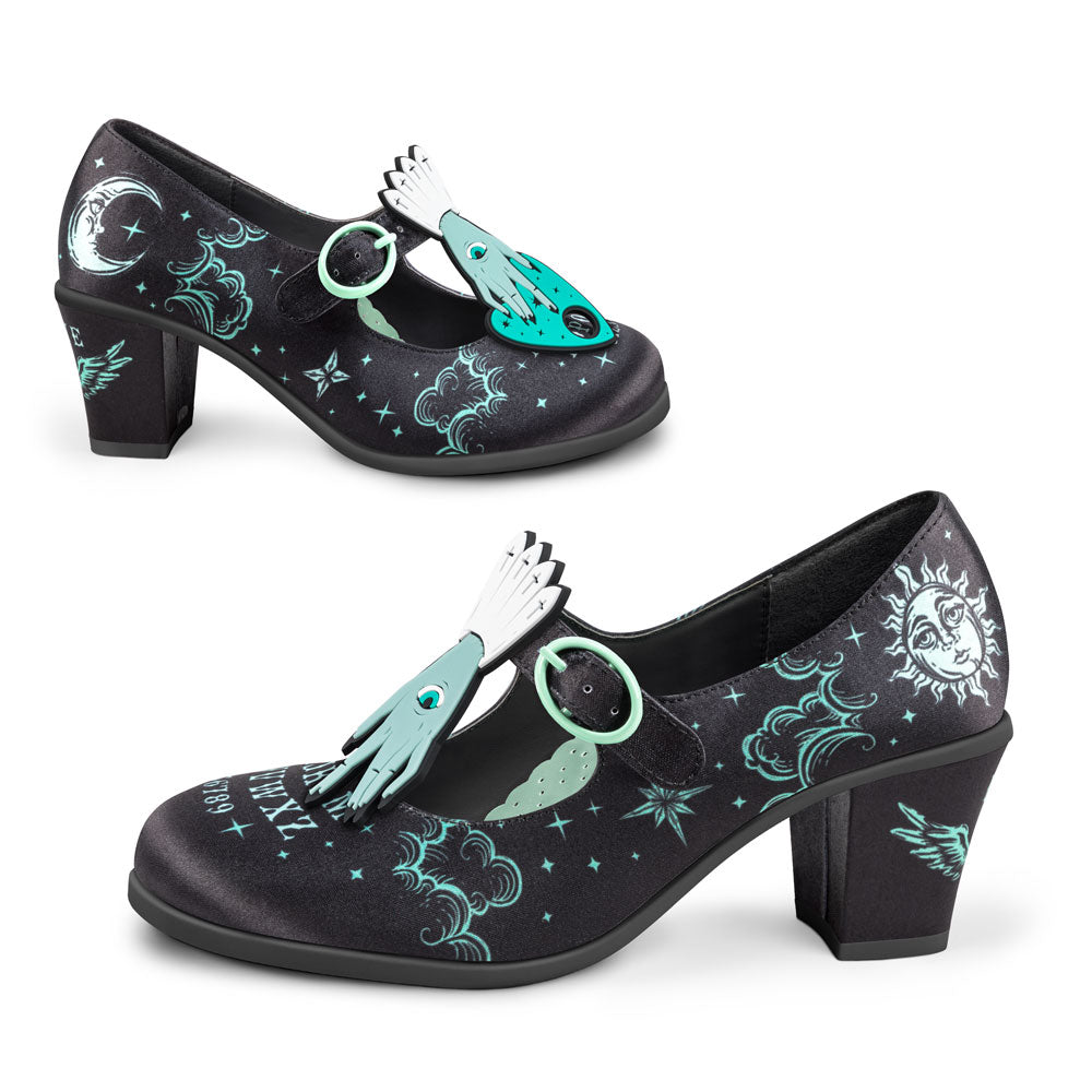 Black high-heeled shoes with decorative elements on a white background