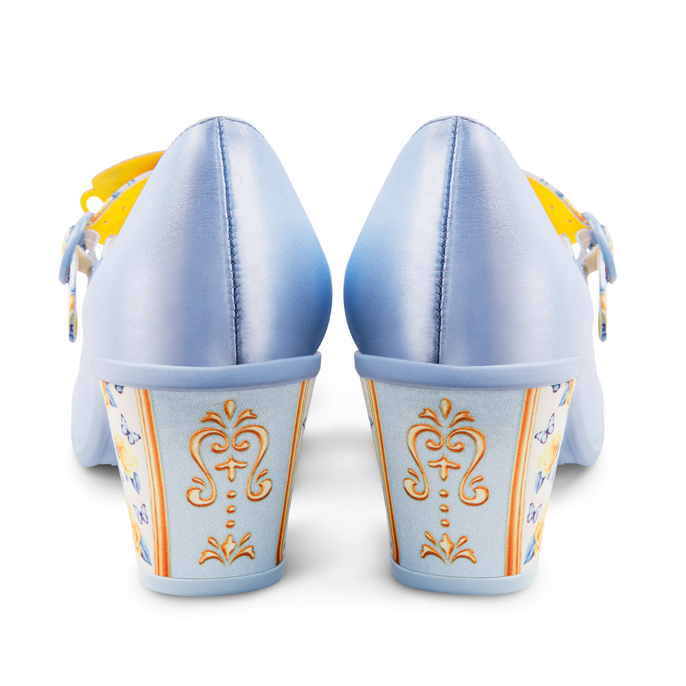 Pair of blue shoes with decorative patterns on a white background