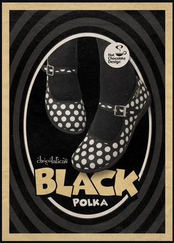 Black polka dot shoes with a circular design and 'Hot Chocolate Design' logo.