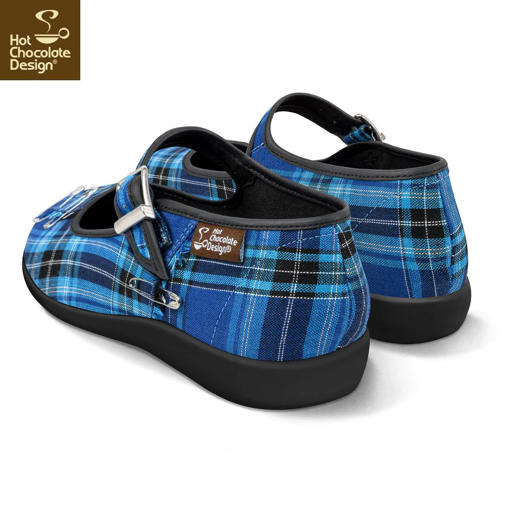 Blue plaid shoes with black soles on a white background, featuring Hot Chocolate Design logo.