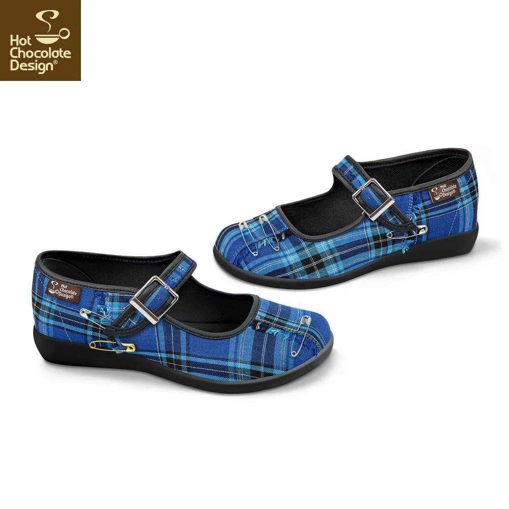 Blue plaid shoes with buckles on a white background, featuring Hot Chocolate Design logo.