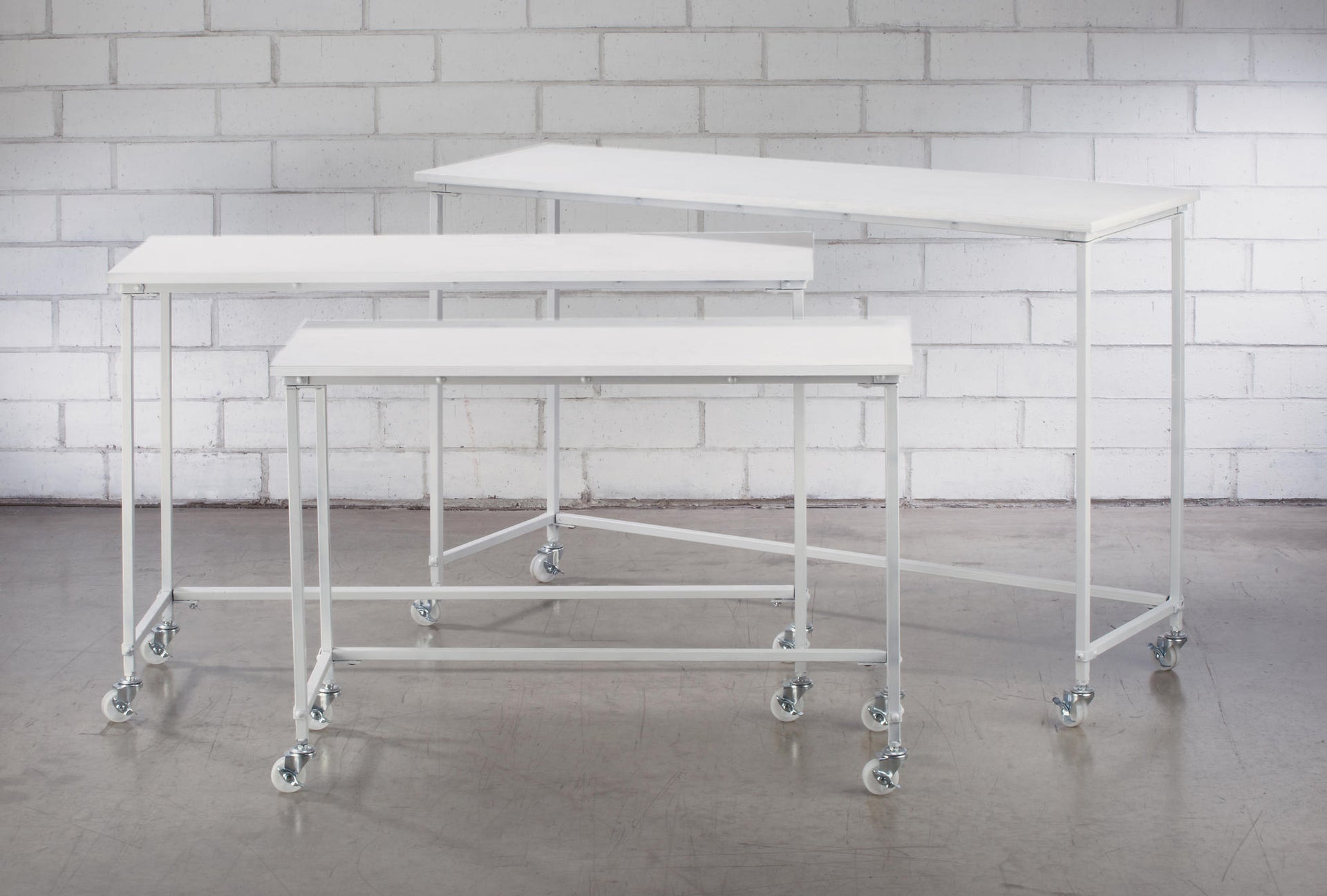 White Nesting Tables w/ Casters (Set of 3)