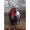 Dark Brown Ceramic Storage Canister with Brown Tassel
