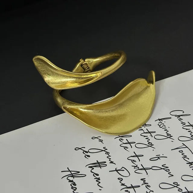 Metal leaf shaped flower bracelet bracelet