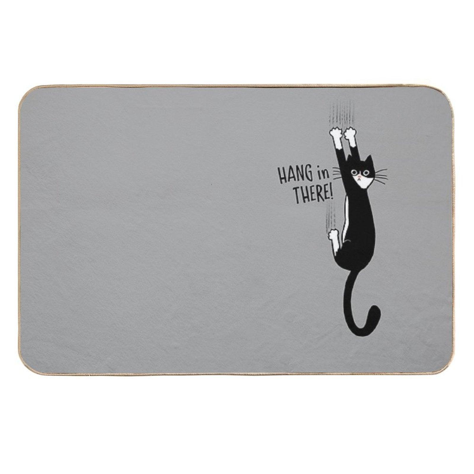 Tuxedo Cat Hanging On Hang In There! Funny Cat Hanging On With Claws  Long-Lasting Bath Mat