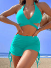 Coastal Curve Halter Bikini Set for Women – V-Neck Crisscross Drawstring Swimsuit with Chic Ring Detail & High-Waisted Boxer Shorts for Summer – Sleek Two-Piece Nylon Swimwear for Women’s Beach & Poolside Style