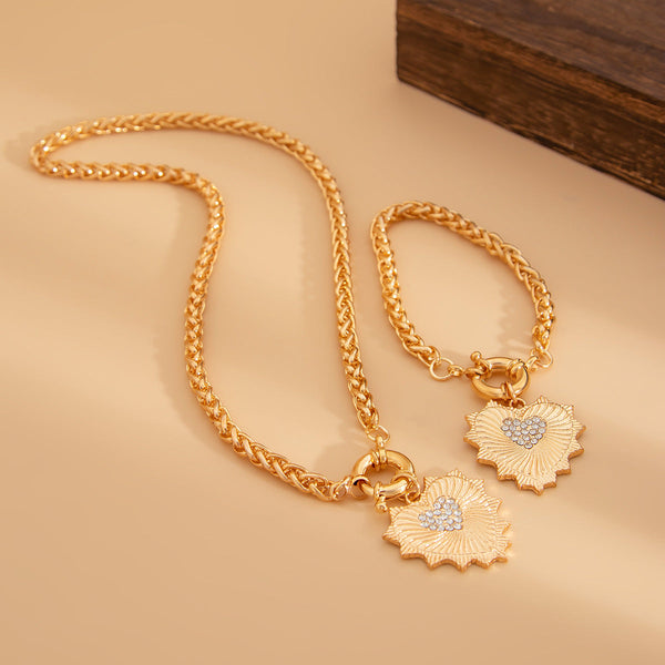 Diamond studded heart-shaped metal pendant necklace, light luxury style spring buckle collarbone chain set