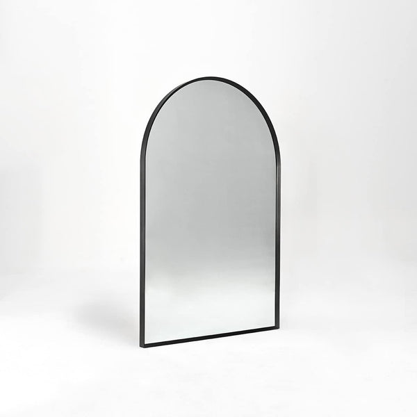 Angled side view of 24x36 Inch Black Metal Framed Arched Wall Mirror showing its slim profile and sturdy construction for versatile wall placement.