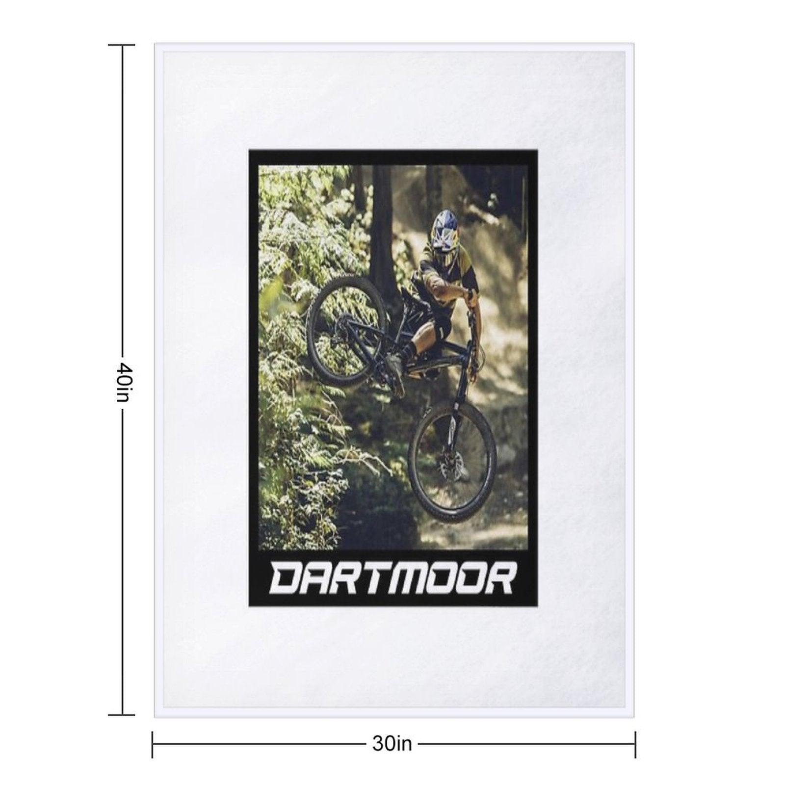 Cyclist Jumping with His Dartmoor Bikes Throw Blanket