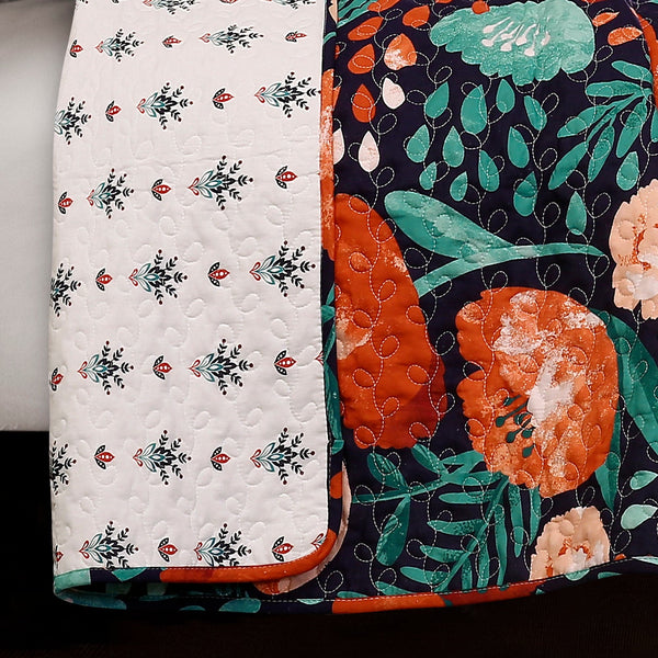 Two floral-patterned fabrics side by side on a plain background