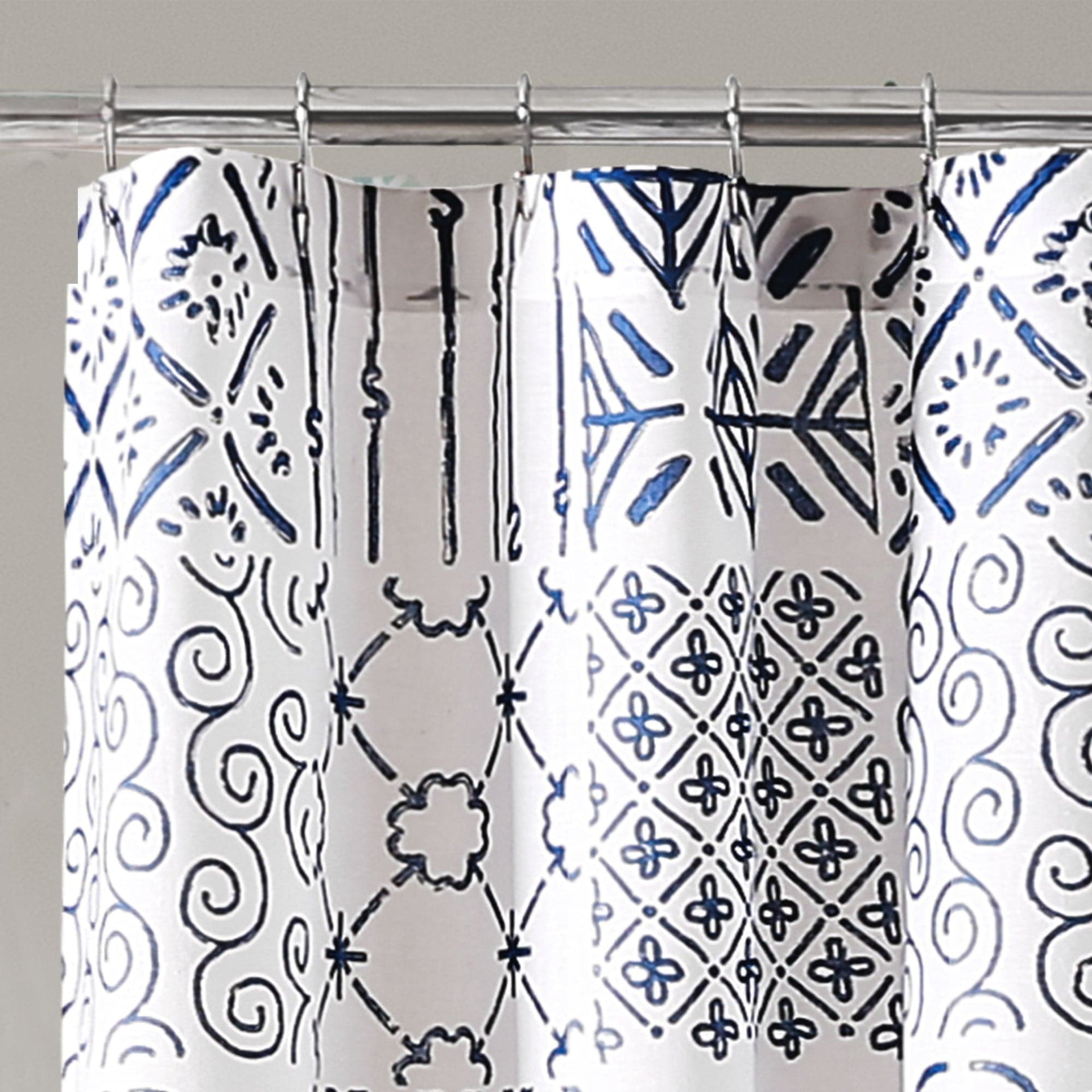Shower curtain with blue and black geometric pattern on white background
