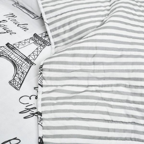 Striped fabric with Eiffel Tower design on a white background