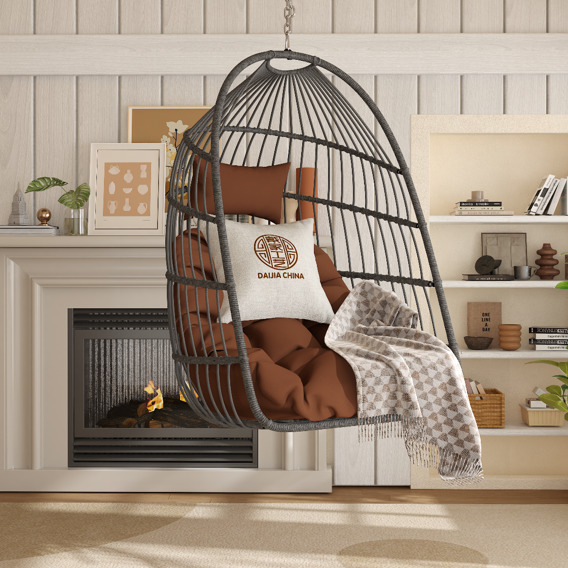 Hanging egg-shaped chair with cushions and a blanket in a cozy living room setting.