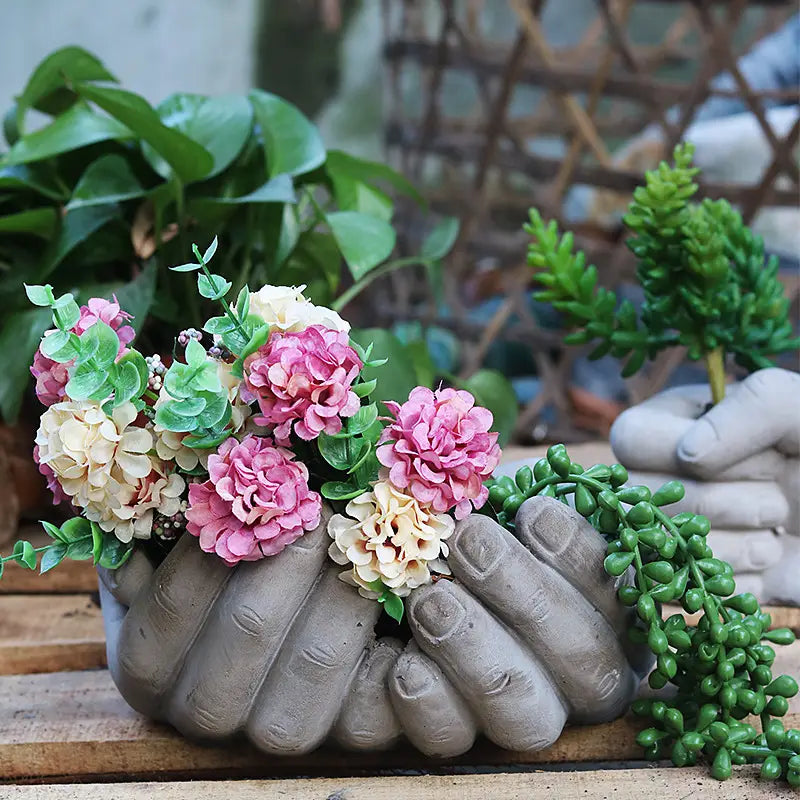 Hand-Shaped Concrete Planters