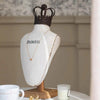 RESIN NECK FORM WITH METAL CROWN