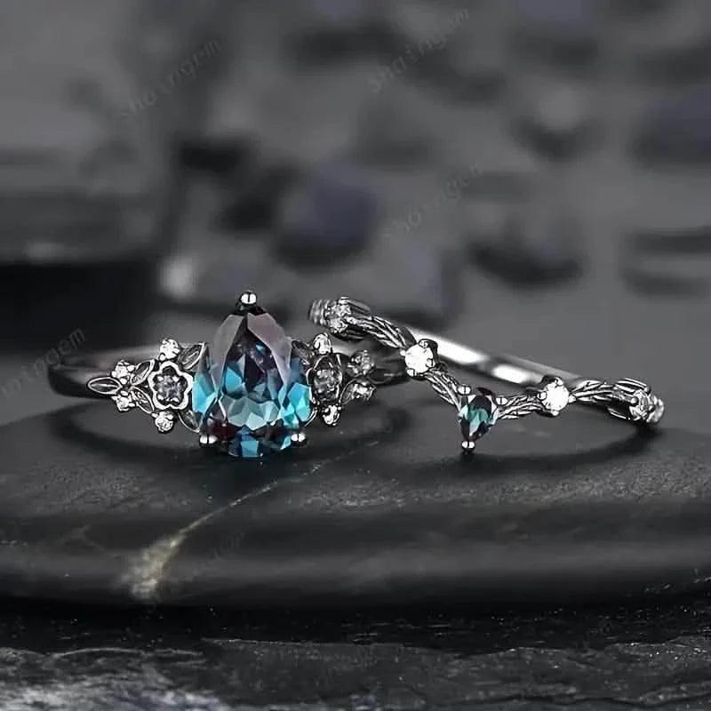 2-Piece Set: Gothic Black & Golden Engagement Ring Set with Pear-Shaped Cubic Zirconia