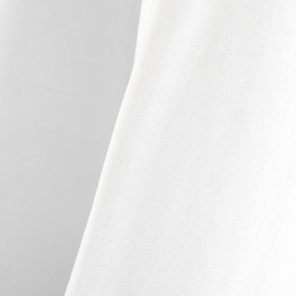 White fabric texture on a gray background