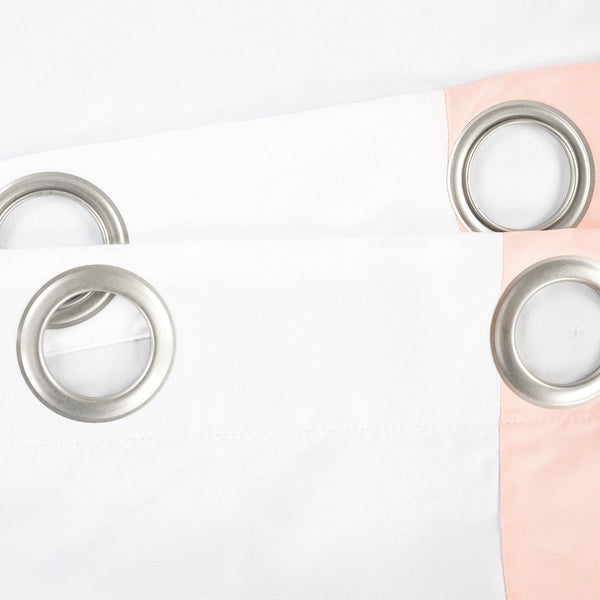 Metallic eyelets on a white background