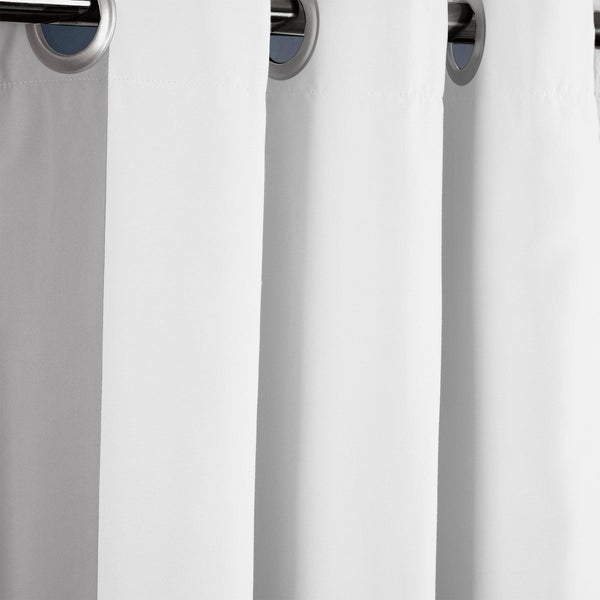 White curtain with metallic rings on a white background