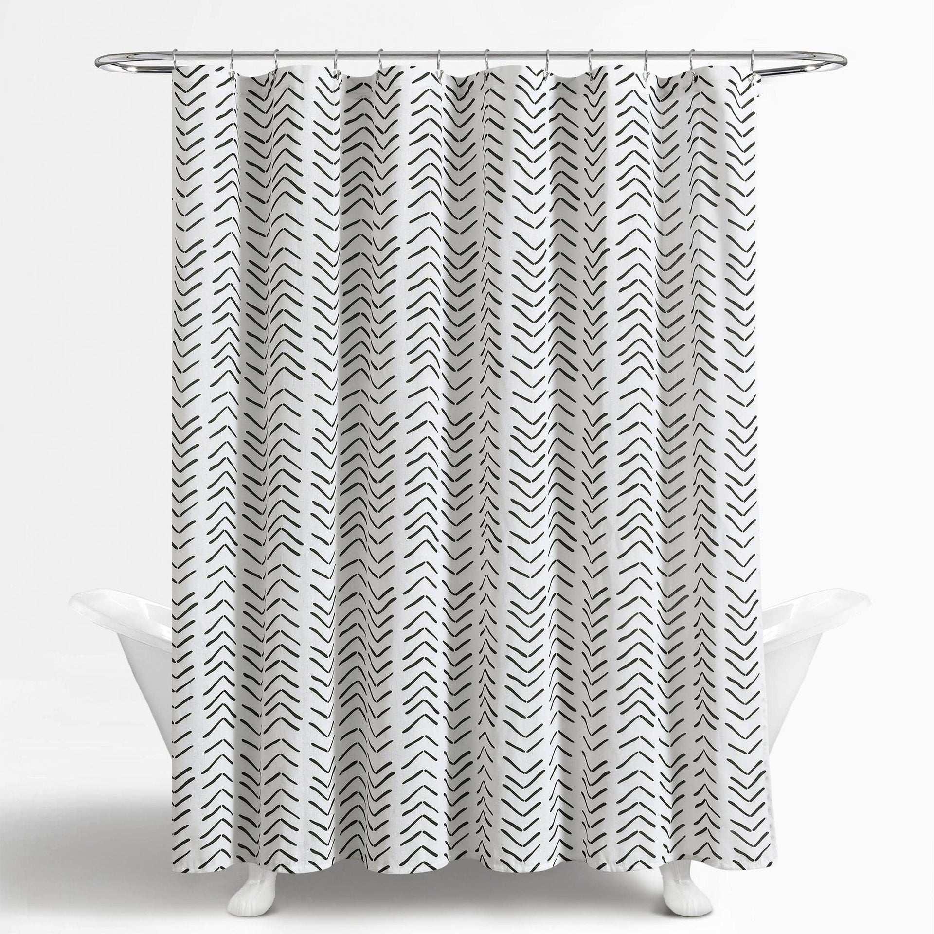 Shower curtain with black chevron pattern on a white background