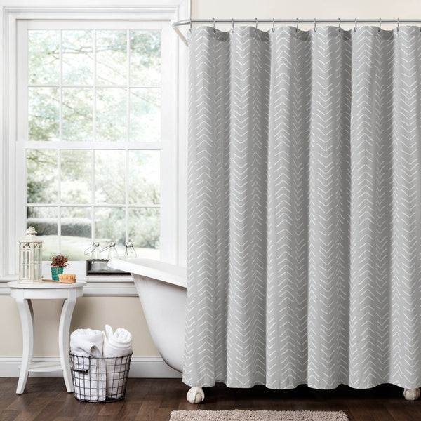 Shower curtain with chevron pattern in a bathroom setting