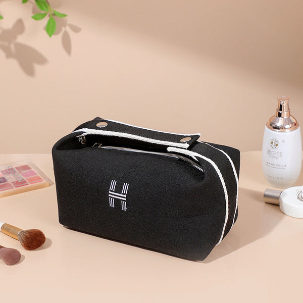 Portable premium canvas makeup bag, large capacity, washable, stylish storage for women