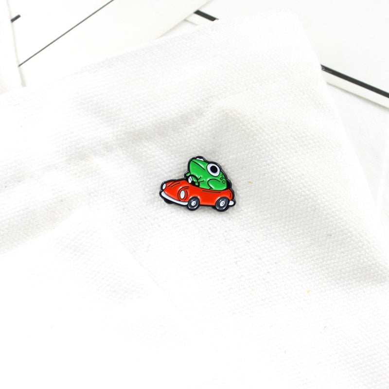 Frog Driver Enamel Pin Small Red Car Brooch Backpack Clothes Lapel Funny Animal Frog Jewelry Gift for Friends Children