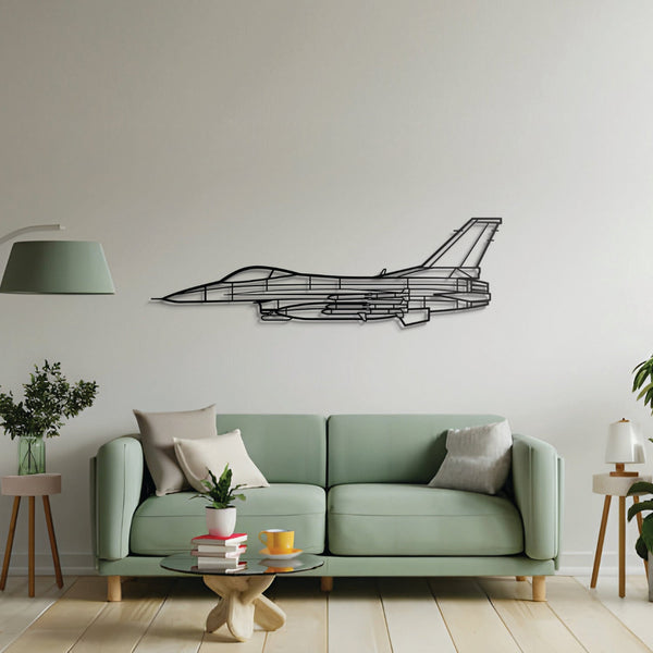 Modern living room with a green sofa and airplane wall decoration.