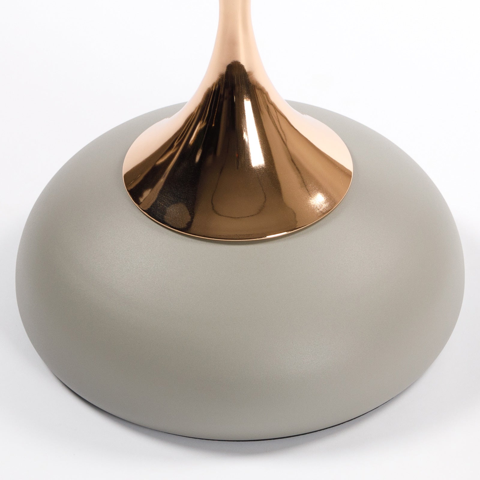 Base detail of the Mermaid Tail End Coffee Table Round Side Table with a matte gray finish and rose gold pedestal connection.