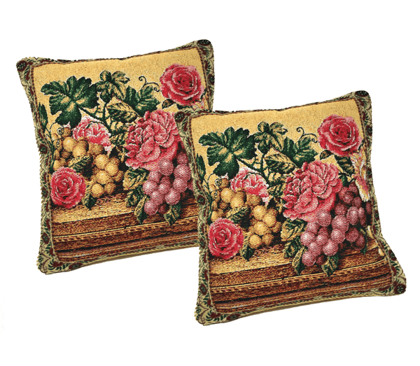 Two decorative pillows with floral and fruit pattern on a white background