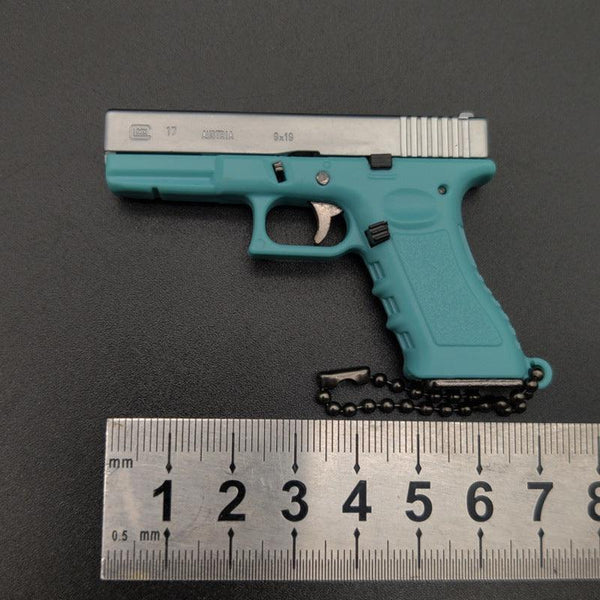 New Empire 1:3 Glock G17 alloy keychain, realistic gun model with detachable soldier gear & bullets.