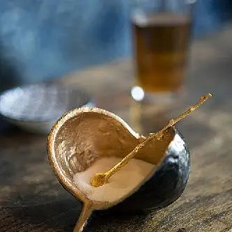 BROWN AND GOLD POD BOWL WITH ONE 4