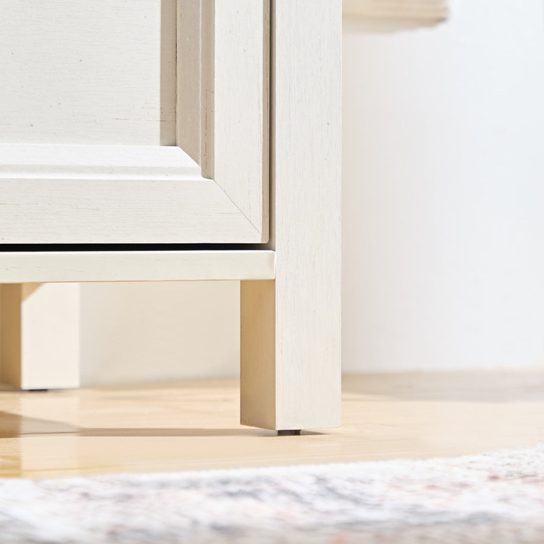 Bottom leg detail of the Farmhouse 5 Drawers Dresser Chests for Bedroom, emphasizing its sturdy construction and clean farmhouse lines.