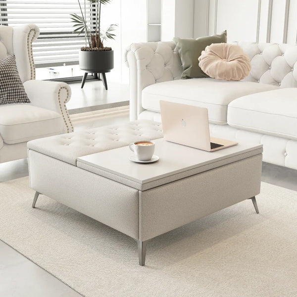 Modern living room with a coffee table, laptop, and cup of coffee.