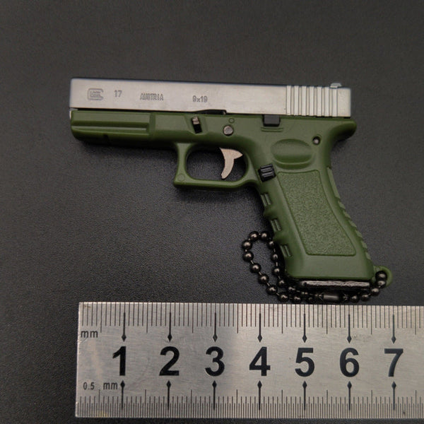 New Empire 1:3 Glock G17 alloy keychain, realistic gun model with detachable soldier gear & bullets.