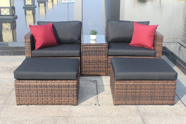 Outdoor patio furniture set with cushions on a patio