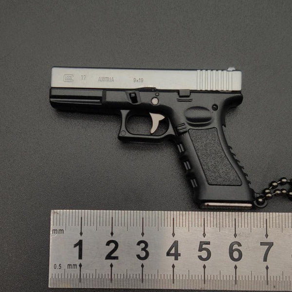 New Empire 1:3 Glock G17 alloy keychain, realistic gun model with detachable soldier gear & bullets.