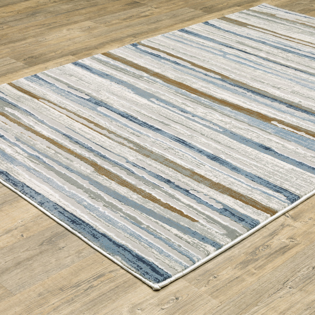 3' X 5' Grey Blue Ivory Brown Beige And Navy Abstract Power Loom Stain Resistant Area Rug