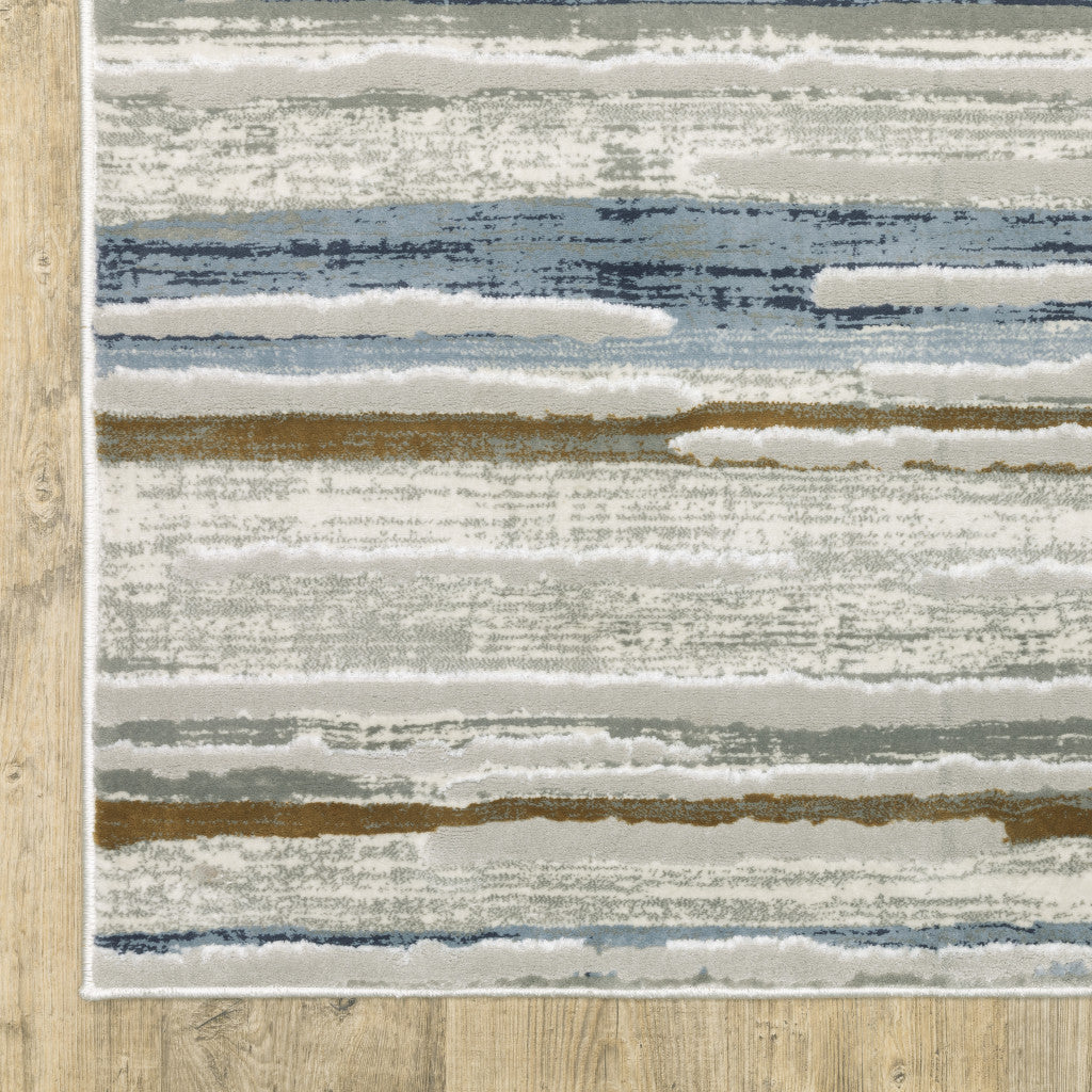 3' X 5' Grey Blue Ivory Brown Beige And Navy Abstract Power Loom Stain Resistant Area Rug