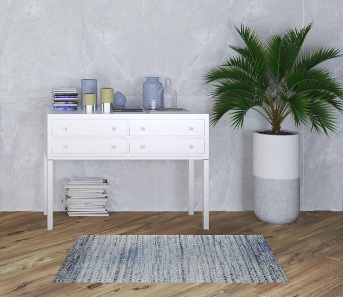 10' X 14' Blue And Ivory Abstract Power Loom Stain Resistant Area Rug