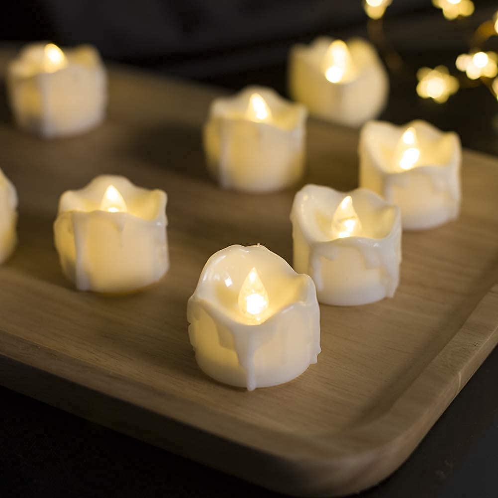 24 Flickering Tea Lights with Timer, Extra Batteries Included