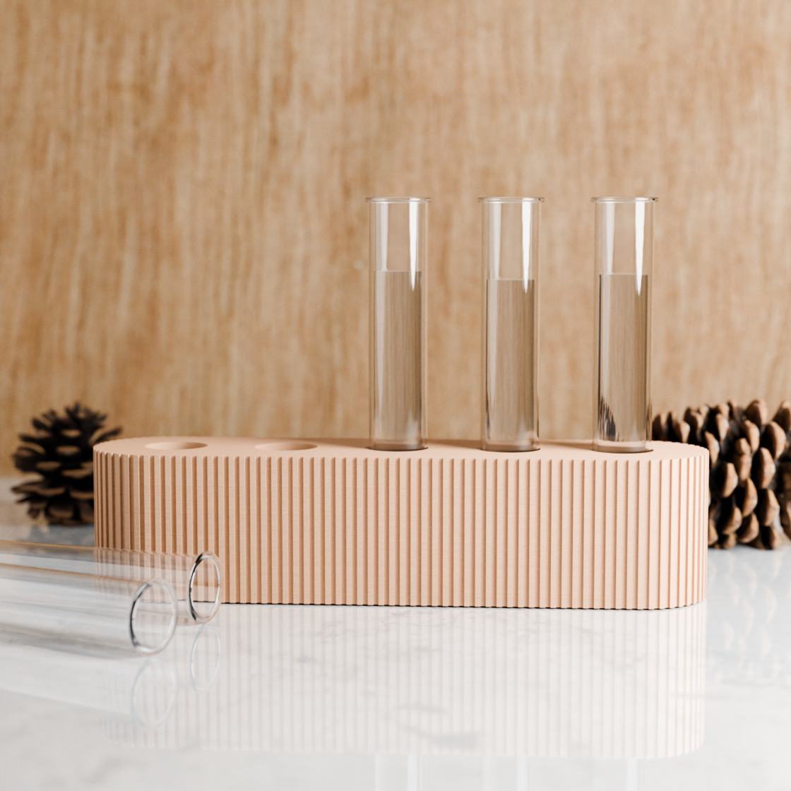 Three clear test tubes on a beige stand against a wooden background