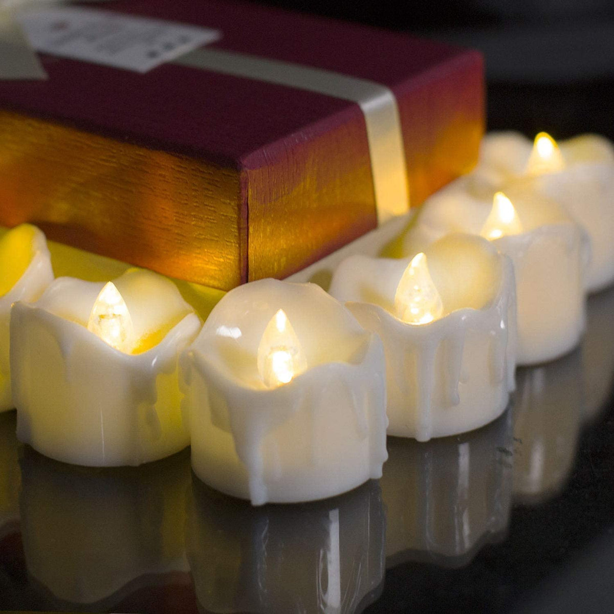 24 Flickering Tea Lights with Timer, Extra Batteries Included